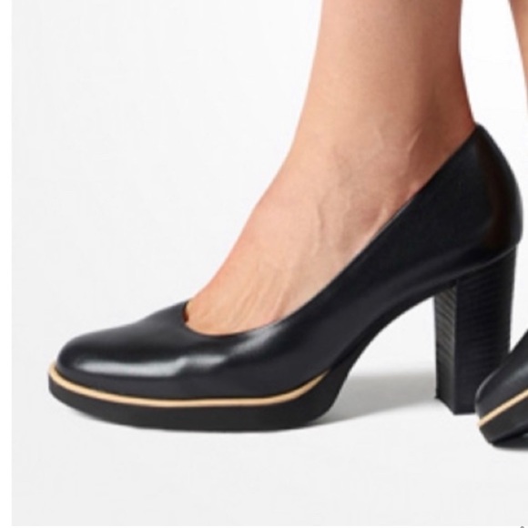 Black leather Platform Pumps 
Never Worn, in Box